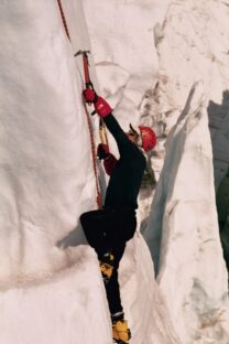 Nicholas Meyler climbing a steep mountain