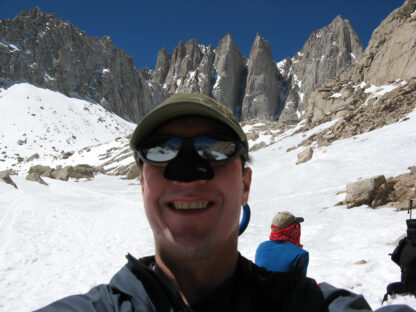 Nicholas Meyler mountaineering on a rocky trail