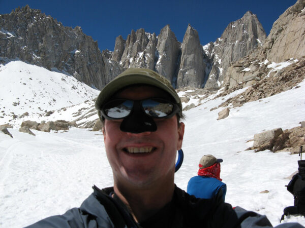 Nicholas Meyler mountaineering on a rocky trail
