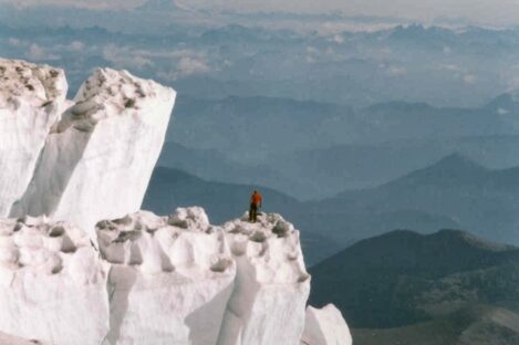 Nicholas Meyler trekking through mountainous region